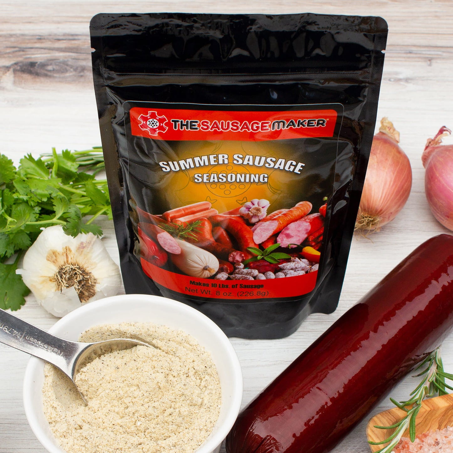 Summer sausage seasoning package with ingredients on a wooden surface
