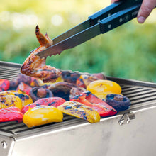 tsm-heavy-duty-portable-tool-box-grill;TSM-Toolbox-Charcoal-Grill-Infographic;side_view_of_the_portable_TSM_tool_box_grill;closed_position_of_the_tool_box_grill;21-lb-heavy-duty-portable-grill-to-last-a-lifetime;cooking_sausages_on_grill;some_vegetables_and_chicken_wings_on_TSM_tool_box_grill