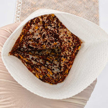 A close-up view of the inside of the hot pepper spice-lined sausage casings.
