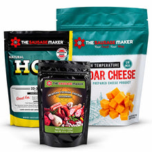 Three Sausage Maker branded packaged food products arranged together on a white background: a large high-temp cheddar cheese bag, natural hog casings, and a black 6 oz jalapeño cheddar seasoning bag pouch in front.