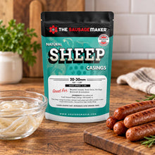 A bag of Natural Sheep Casings stands on a wooden table in a kitchen setting, with cooked sausages nearby.