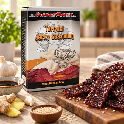 A box of Sausage Maker Teriyaki Jerky Seasoning stands on a kitchen counter.